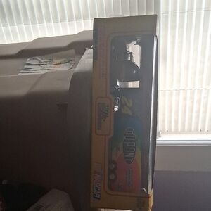 Nascar Die-Cast Car with Yellow and Black Accents